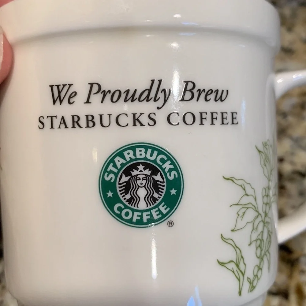 We Proudly Brew Starbucks coffee mug 12 ounces White and green